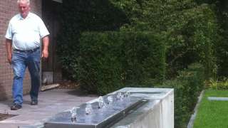 monteren rvs water element in Tilburg door a van spelde hovenier